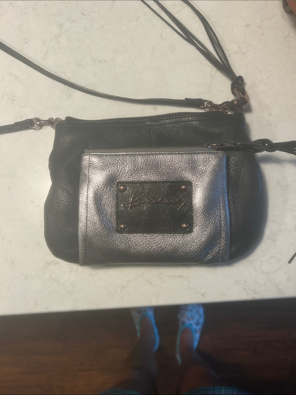 b. makowsky Black Crossbody with Metallic Silver Front Pocket